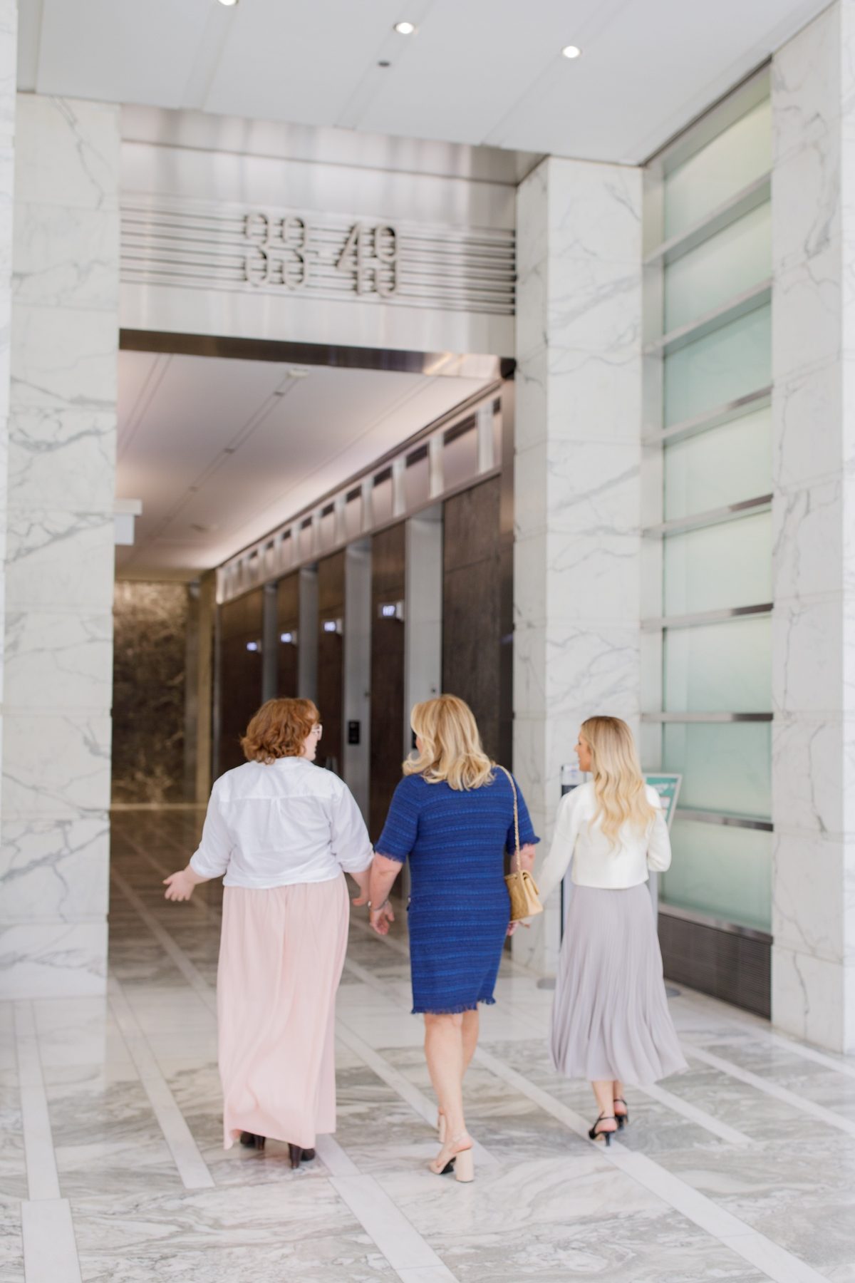 Beth McCormack walking with members of her team